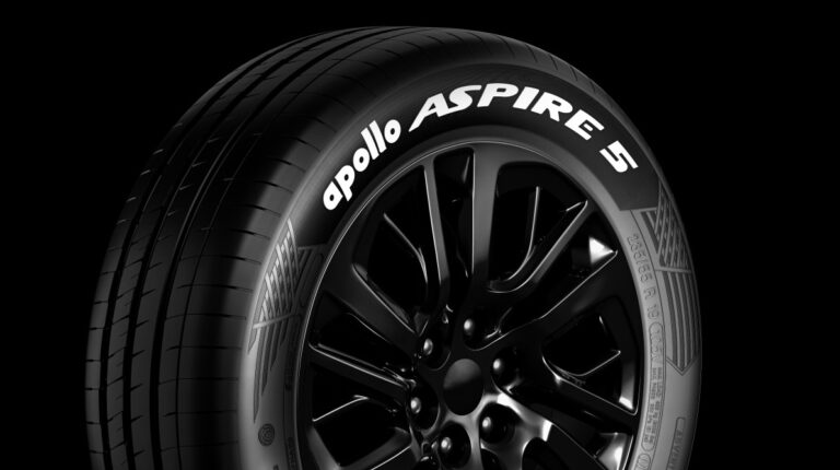 Side image of the Apollo Tyres Aspire 5 UKP tire, against a black background.
