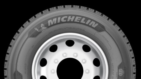 Michelin X Line Grip D tire shown in profile against a black background.