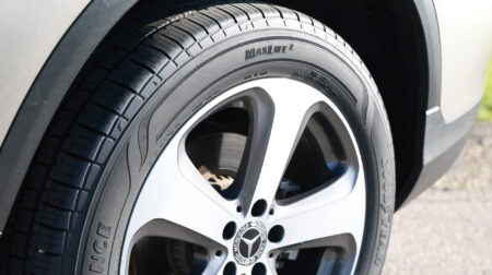 The Goodyear Assurance MaxLife 2 tire shown fitted to a front right wheel of a car.