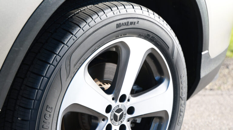 The Goodyear Assurance MaxLife 2 tire shown fitted to a front right wheel of a car.