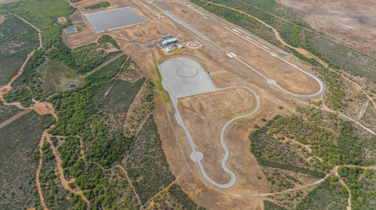 Smithers earns ISO 17025 accreditation at Texas proving ground Smithers Earns ISO 17025 Accreditation at Proving Grounds in Pearsall, Texas, shown here in an aerial show, with winding test traks surrounded by brown and green land.