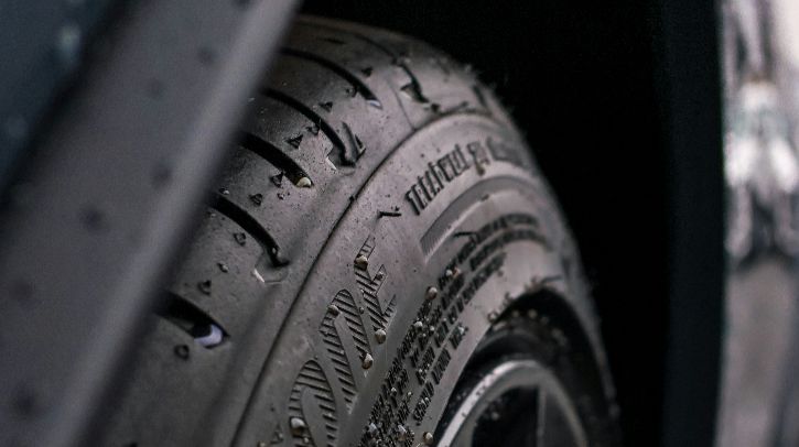 A close up of a tire on a car