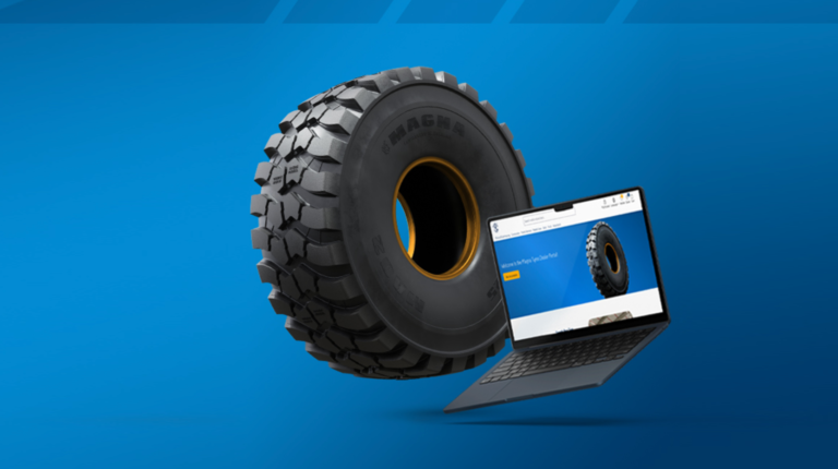 A tire and a tablet displaying the Magna Tyres dealer portal, against a blue background