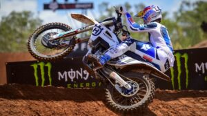 A rider on a motocross bike tackles a corne on a racetrack at the Australian Motocross GP in 2025.