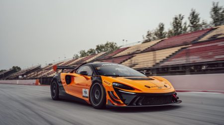 An orange McLaren Trophy racecar.